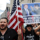Iraqis and supporters rally outside the Theodore Levin United States Courthouse, Wednesday, June 21, 2017 in Detroit. Image via the AP.
